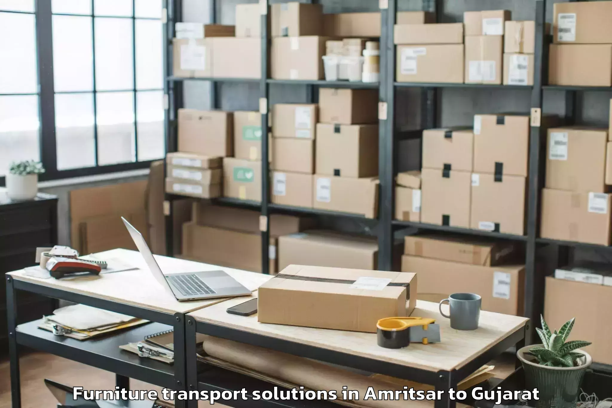 Book Amritsar to Dediapada Furniture Transport Solutions